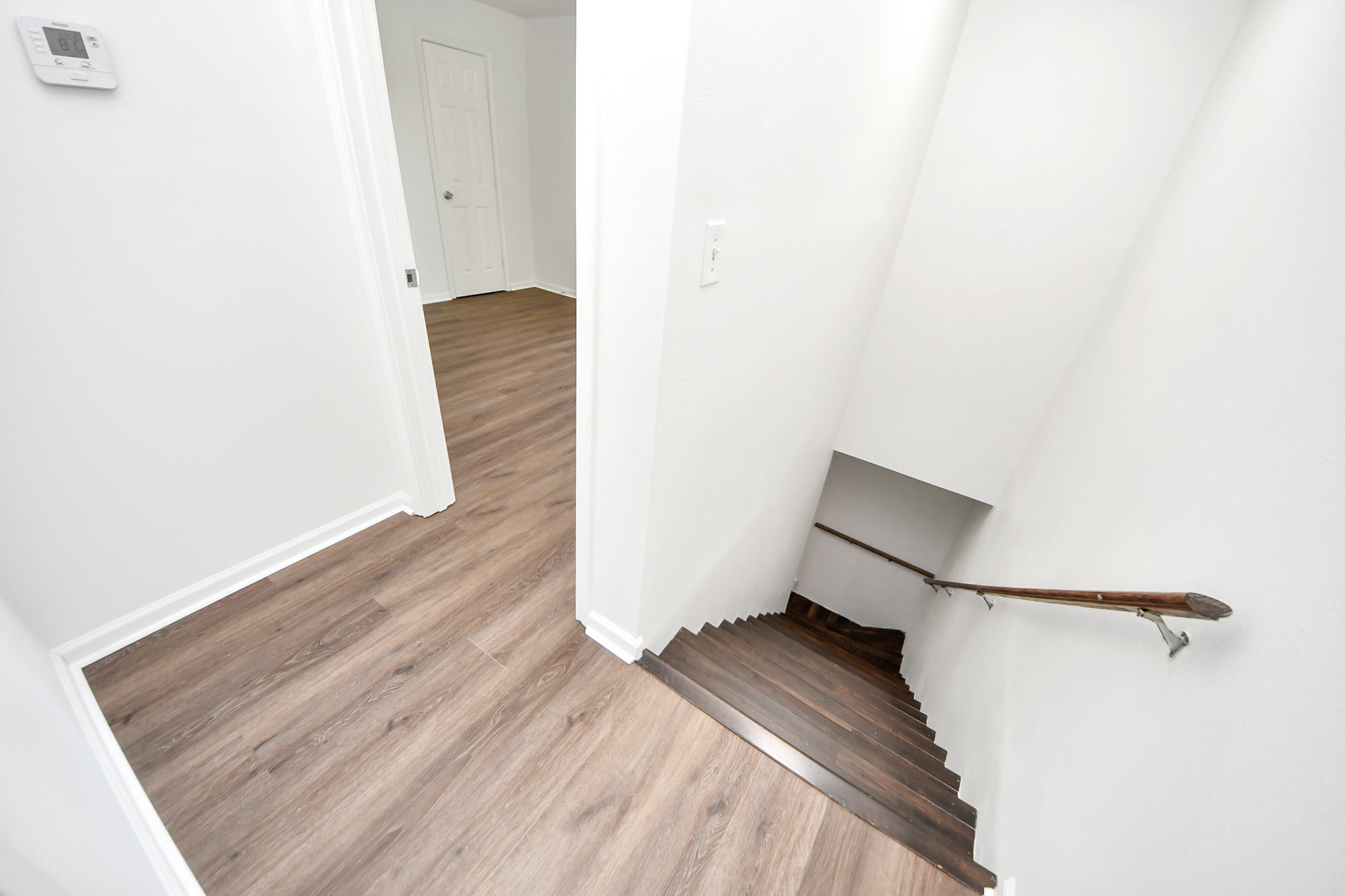12068 Beechnut Street, Unit C Houston, TX 77072 - Photo 24 of 40 a view of a room with wooden floor