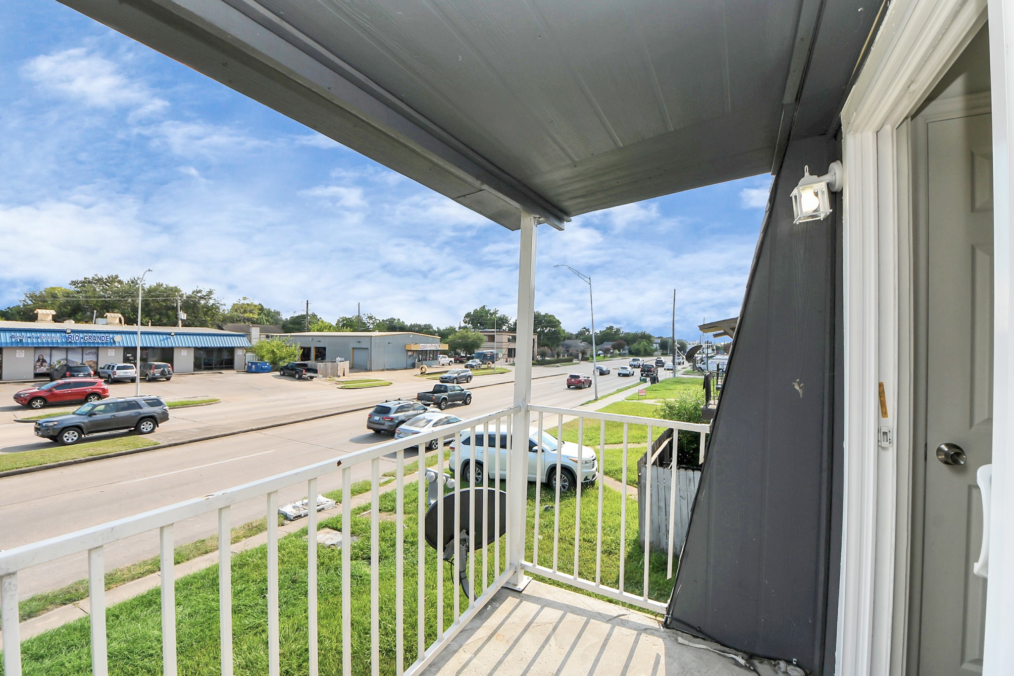 12068 Beechnut Street, Unit C Houston, TX 77072 - Photo 32 of 40 a view of a balcony with city view