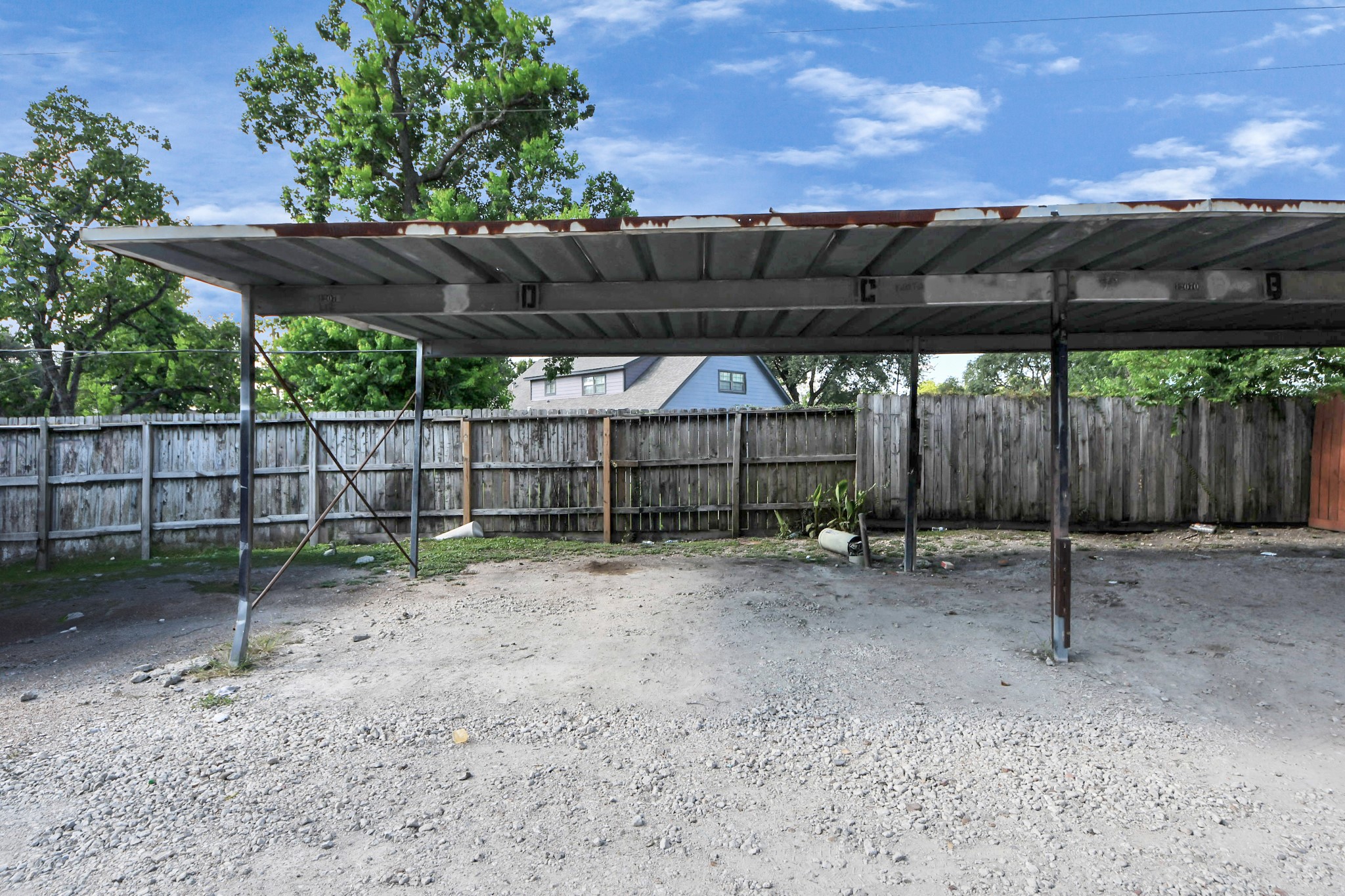 12068 Beechnut Street, Unit C Houston, TX 77072 - Photo 40 of 40 a view of a backyard with wooden fence