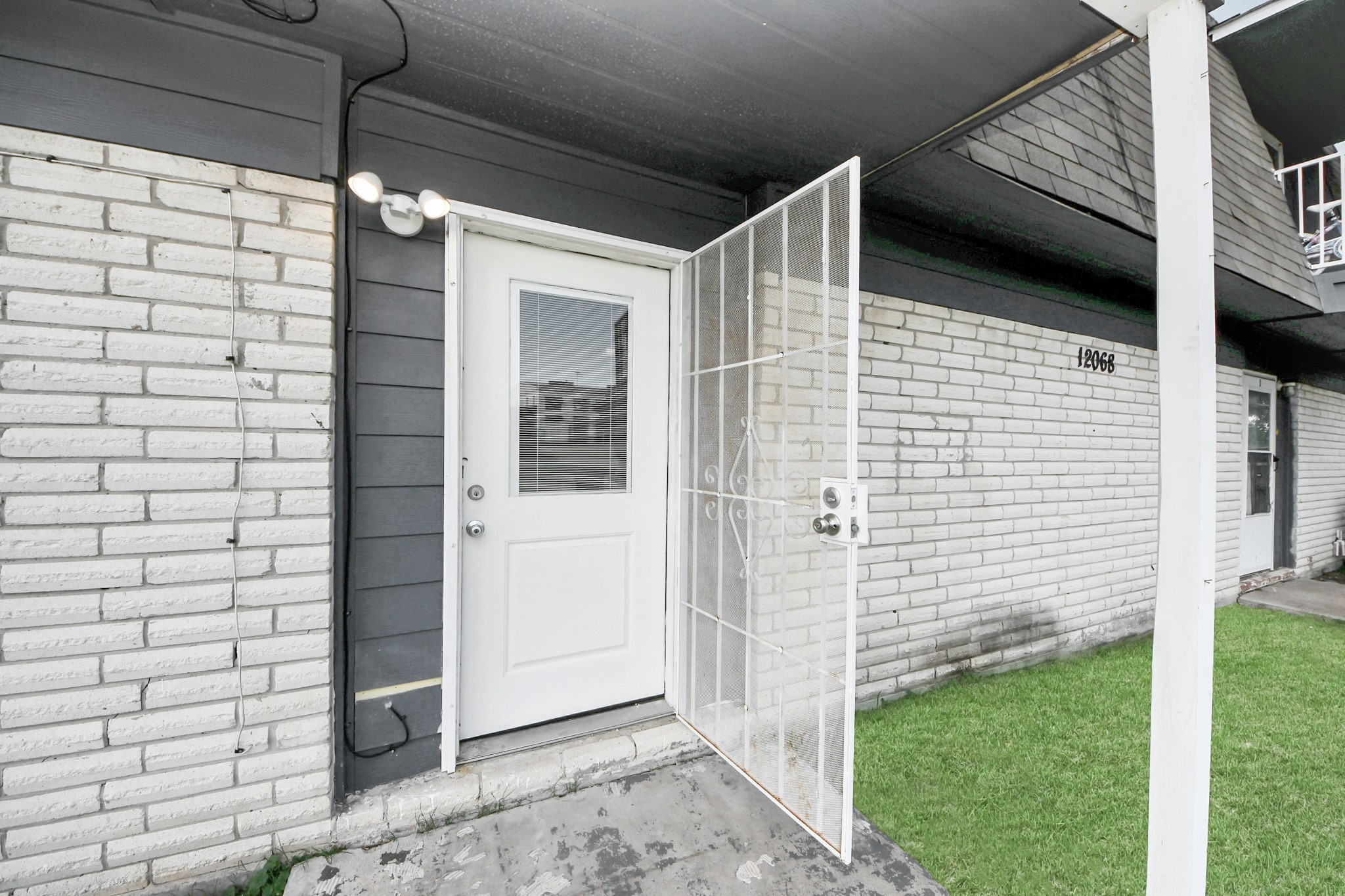 12068 Beechnut Street, Unit C Houston, TX 77072 - Photo 6 of 40 a view of front door and porch