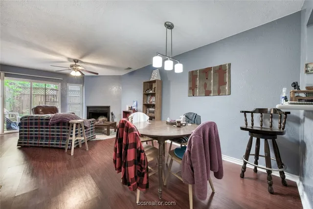 a view of a livingroom with furniture and wooden floor