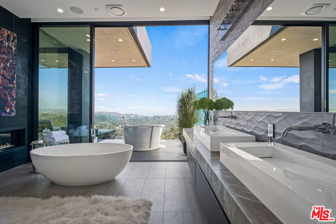 2304 Donella Circle Los Angeles, CA 90077 - Photo 15 of 24 a bathroom with a bathtub and sink