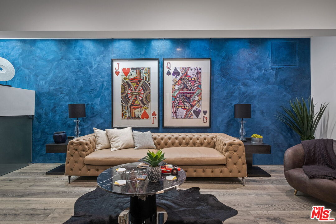 2304 Donella Circle Los Angeles, CA 90077 - Photo 18 of 24 a living room with furniture and a potted plant