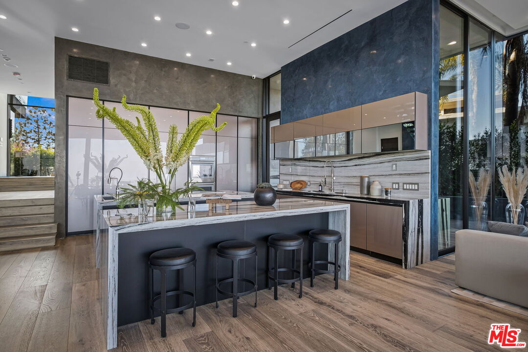 2304 Donella Circle Los Angeles, CA 90077 - Photo 4 of 24 a kitchen with a table and chairs in it