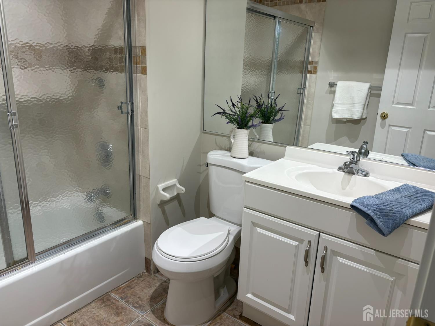 285 Greenfield Road Bridgewater, NJ 08807 - Photo 18 of 26 a bathroom with a sink toilet and shower