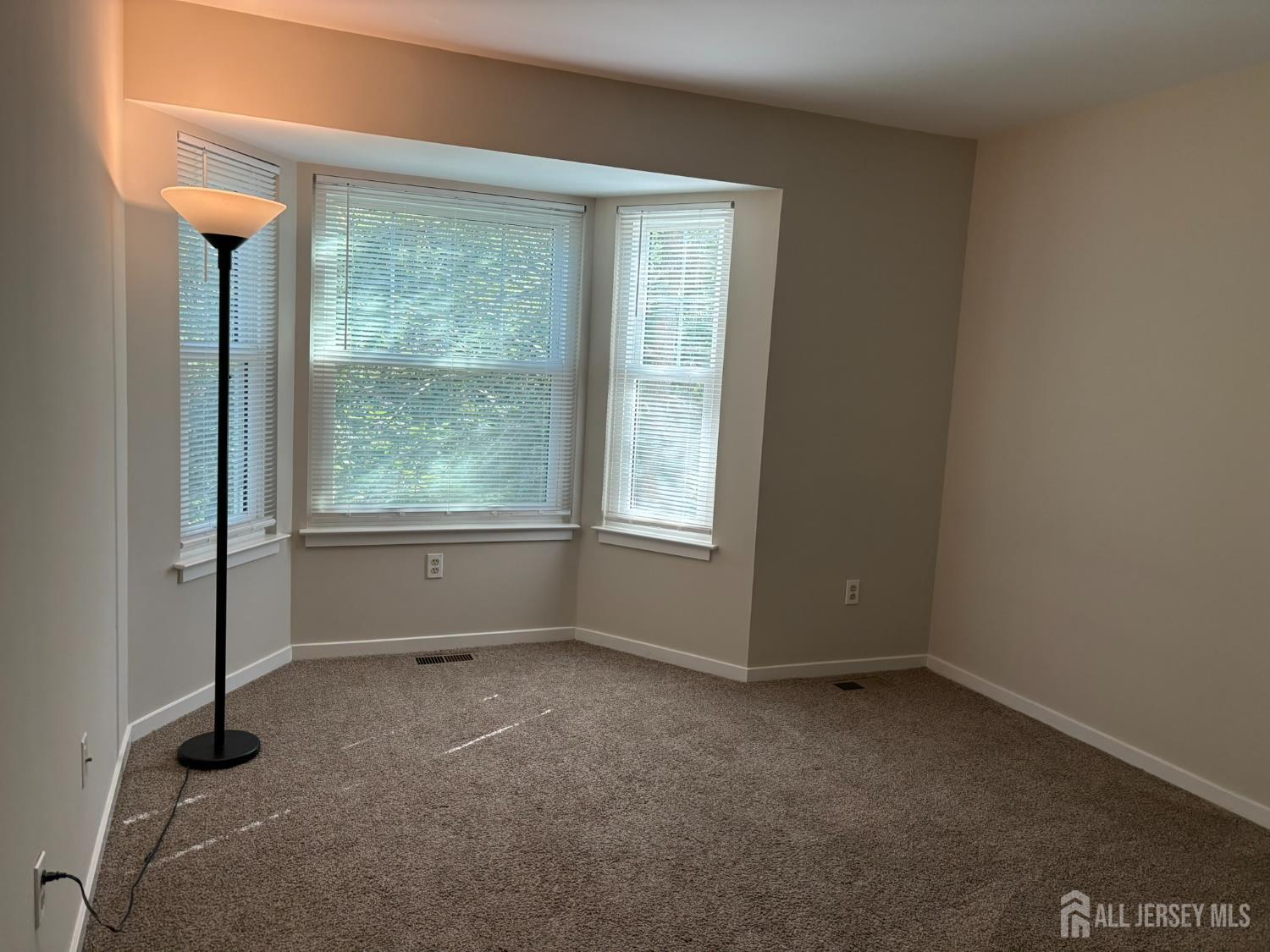 285 Greenfield Road Bridgewater, NJ 08807 - Photo 19 of 26 a view of an empty room with a window