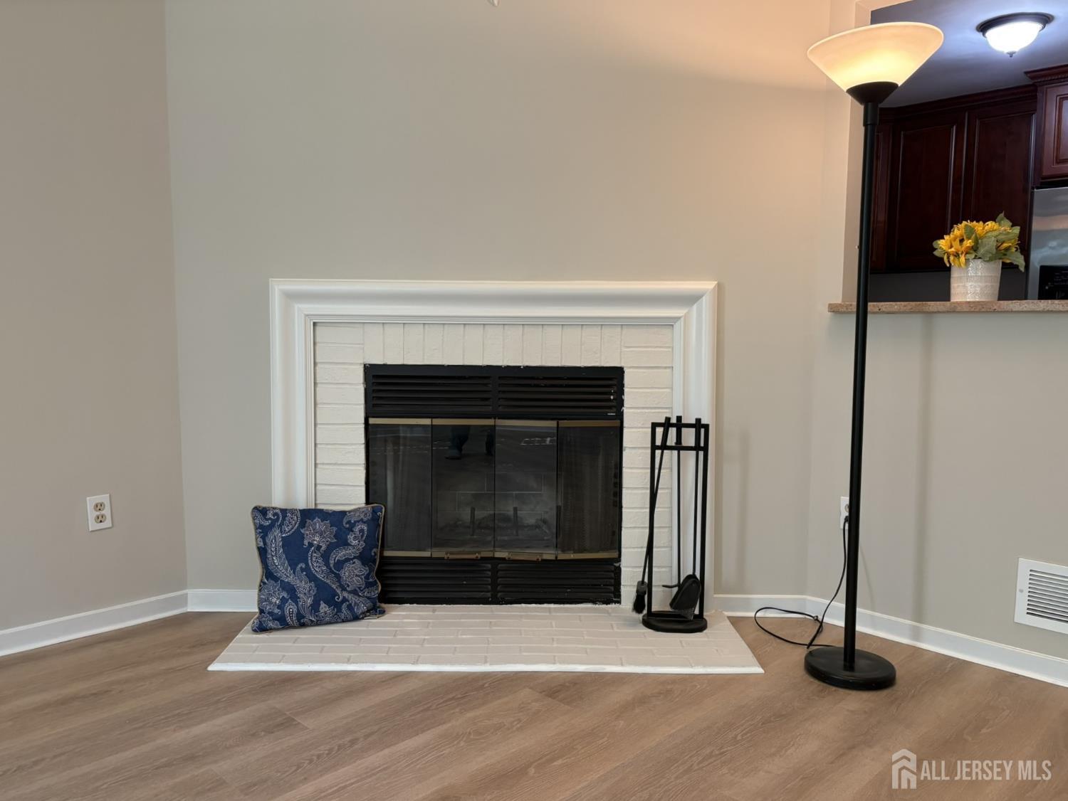 285 Greenfield Road Bridgewater, NJ 08807 - Photo 7 of 26 a living room with furniture and a fireplace