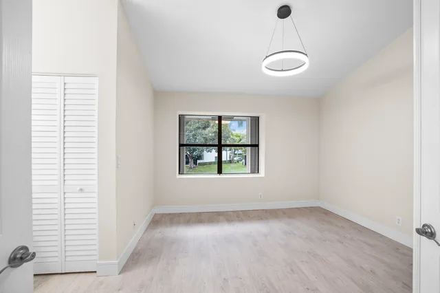 a bathroom with a sink vanity and a mirror