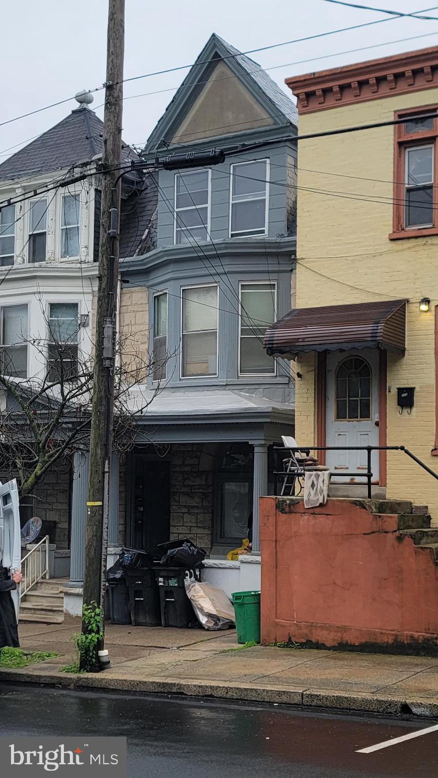 a front view of a house with garage