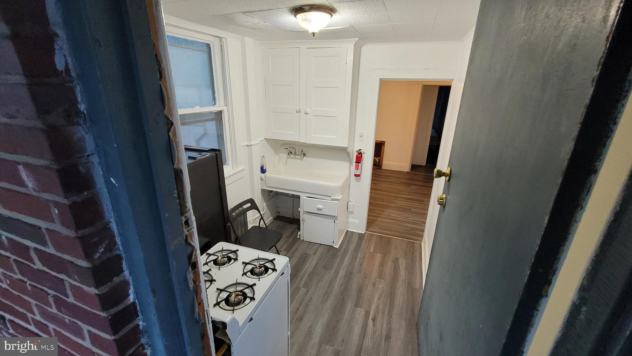 324 Spring Street, Unit 3 Reading, PA 19601 - Photo 17 of 27 a bathroom with a sink and toilet