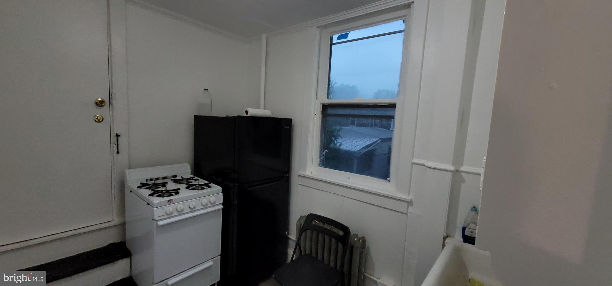 324 Spring Street, Unit 3 Reading, PA 19601 - Photo 25 of 27 a view of walk in closet with wooden floor