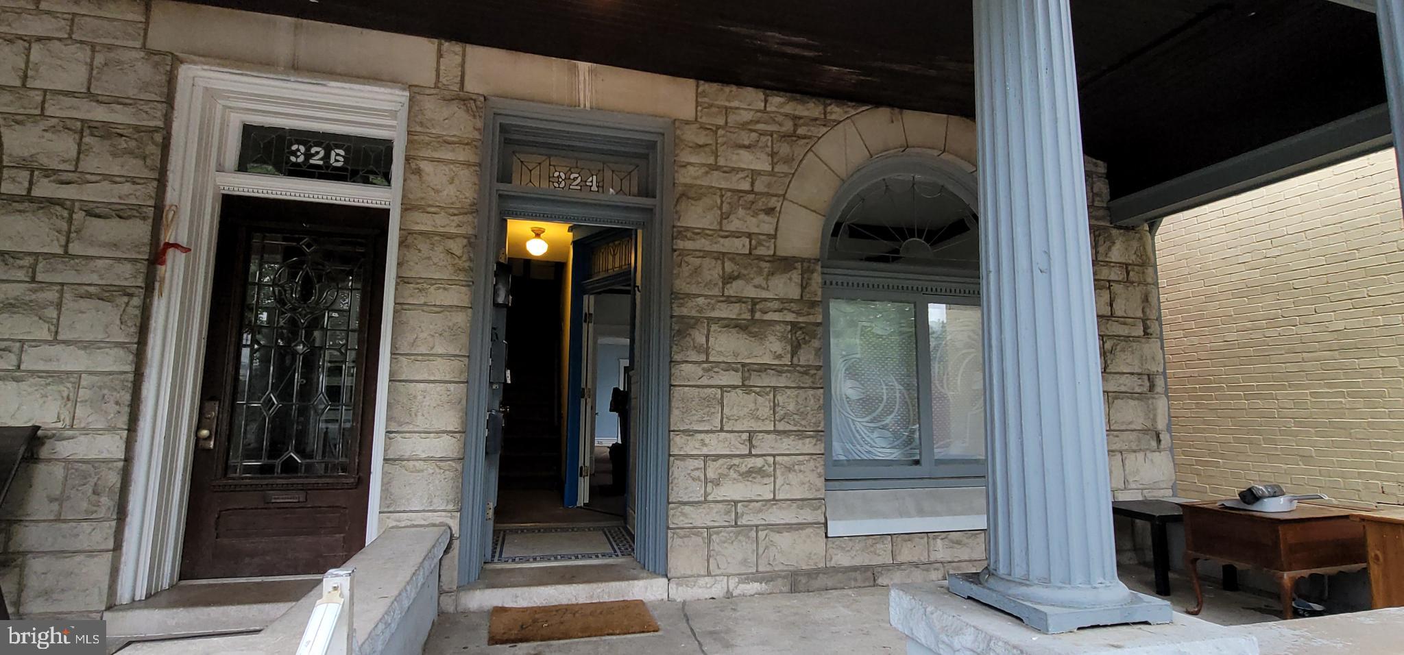 324 Spring Street, Unit 3 Reading, PA 19601 - Photo 4 of 27 a view of a door of the house and a outdoor space