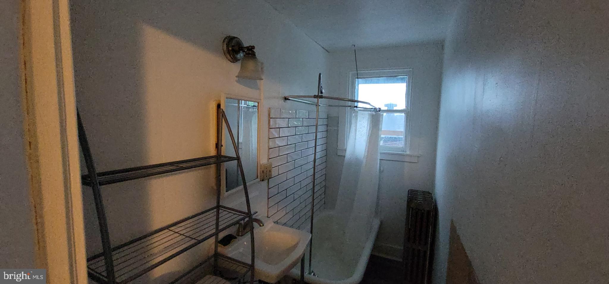 324 Spring Street, Unit 3 Reading, PA 19601 - Photo 6 of 27 a bathroom with a shower