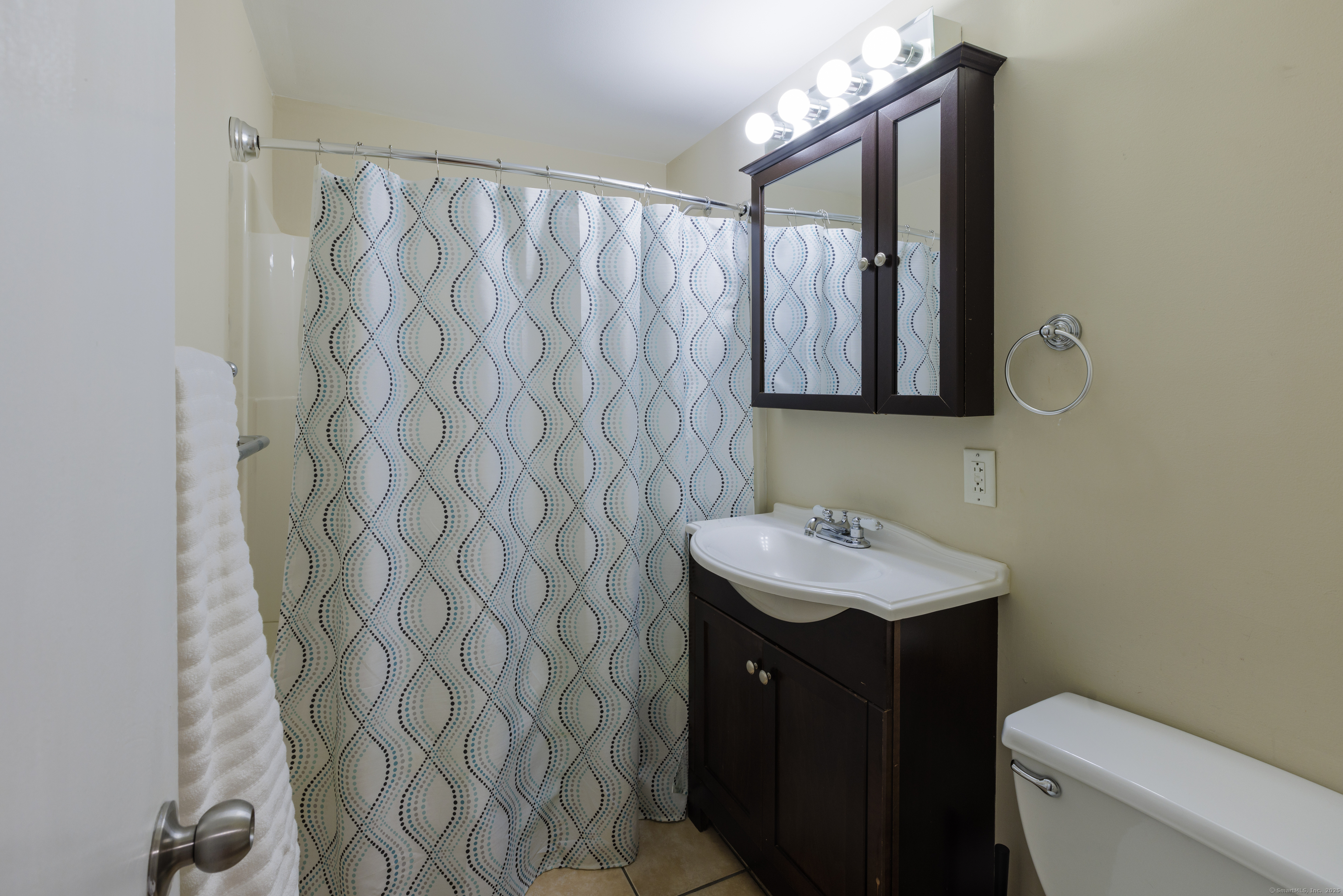 239 A Rockledge Road Lyme, CT 06371 - Photo 17 of 30 a bathroom with a sink and a mirror