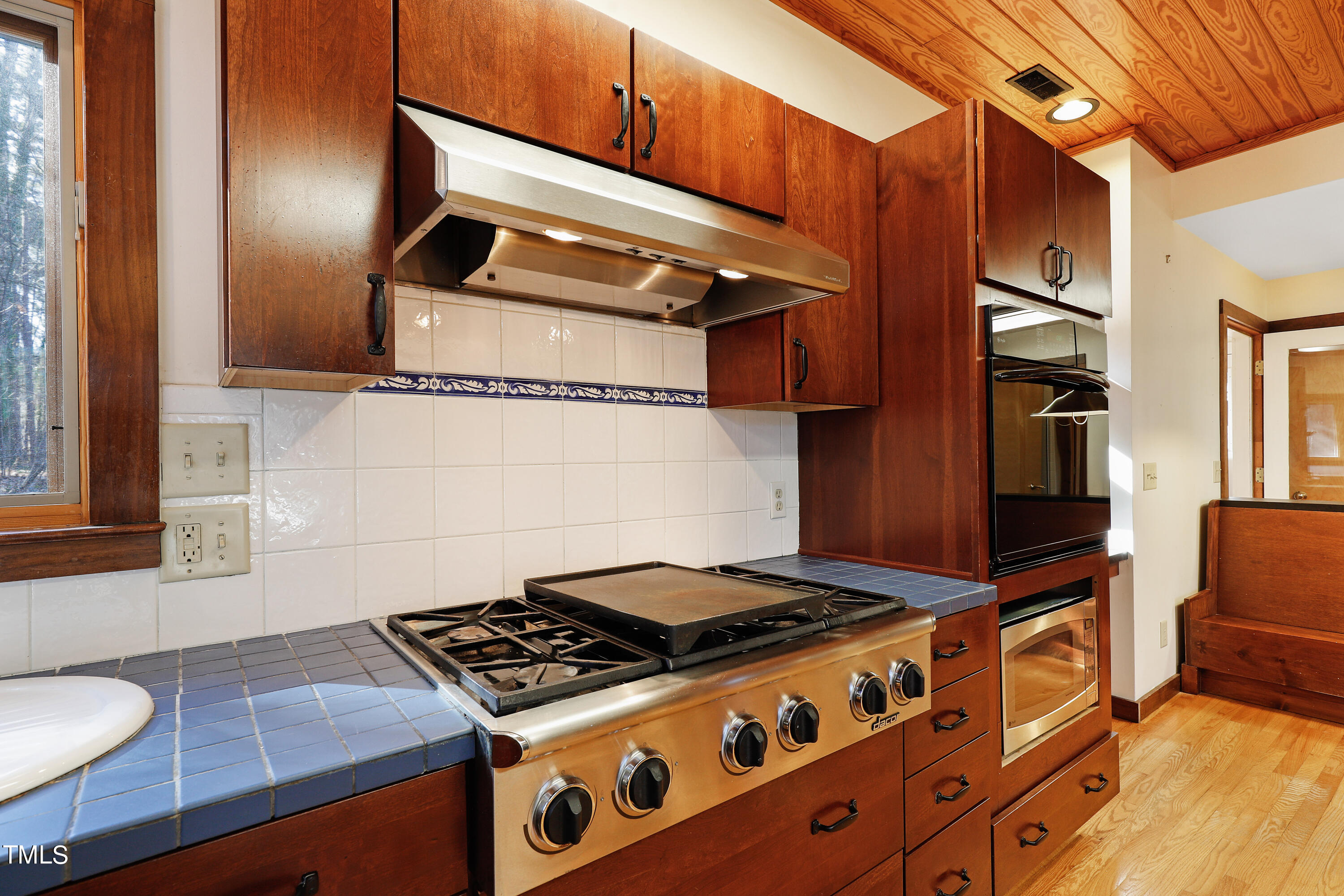 316 Clark Lake Road Durham, NC 27707 - Photo 18 of 65 a stove top oven sitting inside of a kitchen