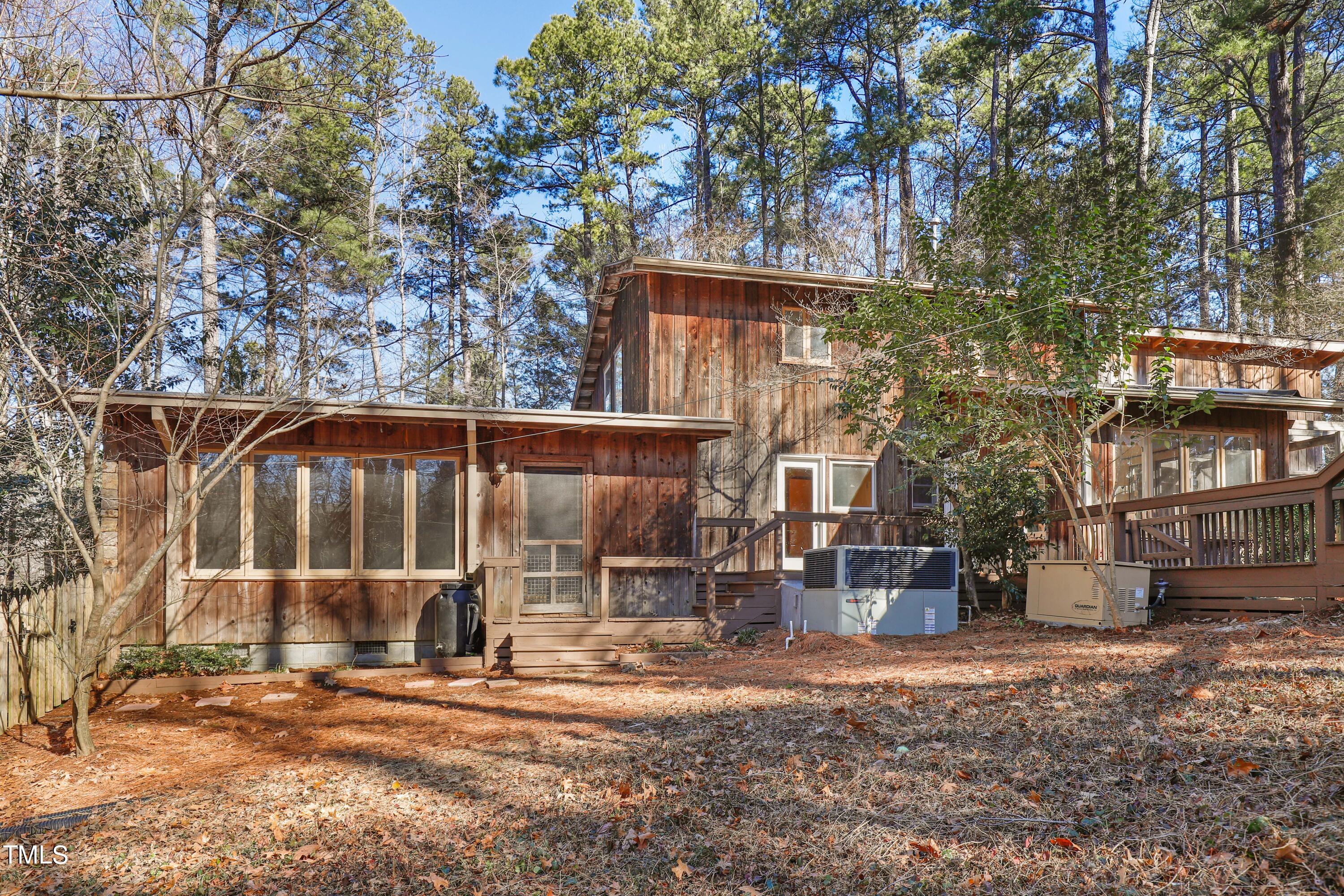 316 Clark Lake Road Durham, NC 27707 - Photo 2 of 65 a view of a house with a yard