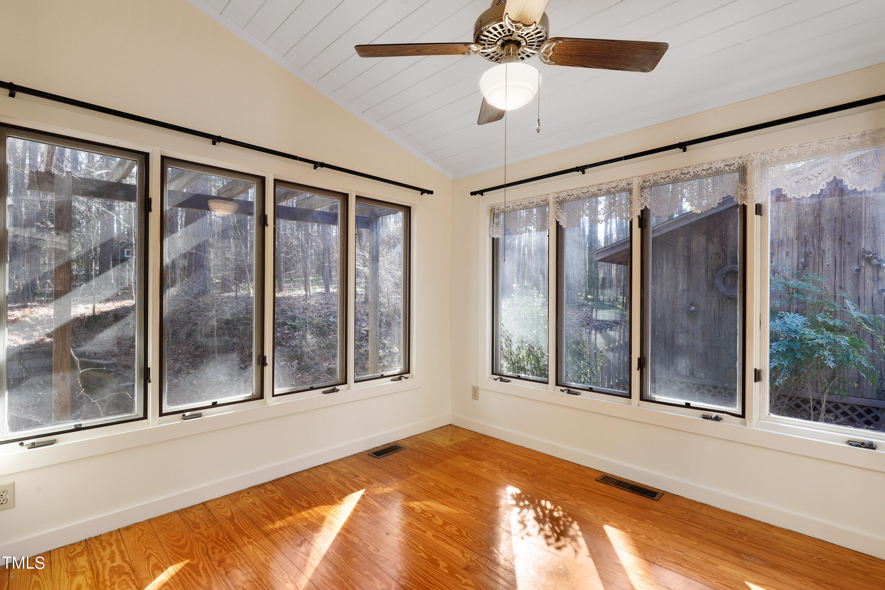 316 Clark Lake Road Durham, NC 27707 - Photo 22 of 65 a view of a large window with an outdoor space