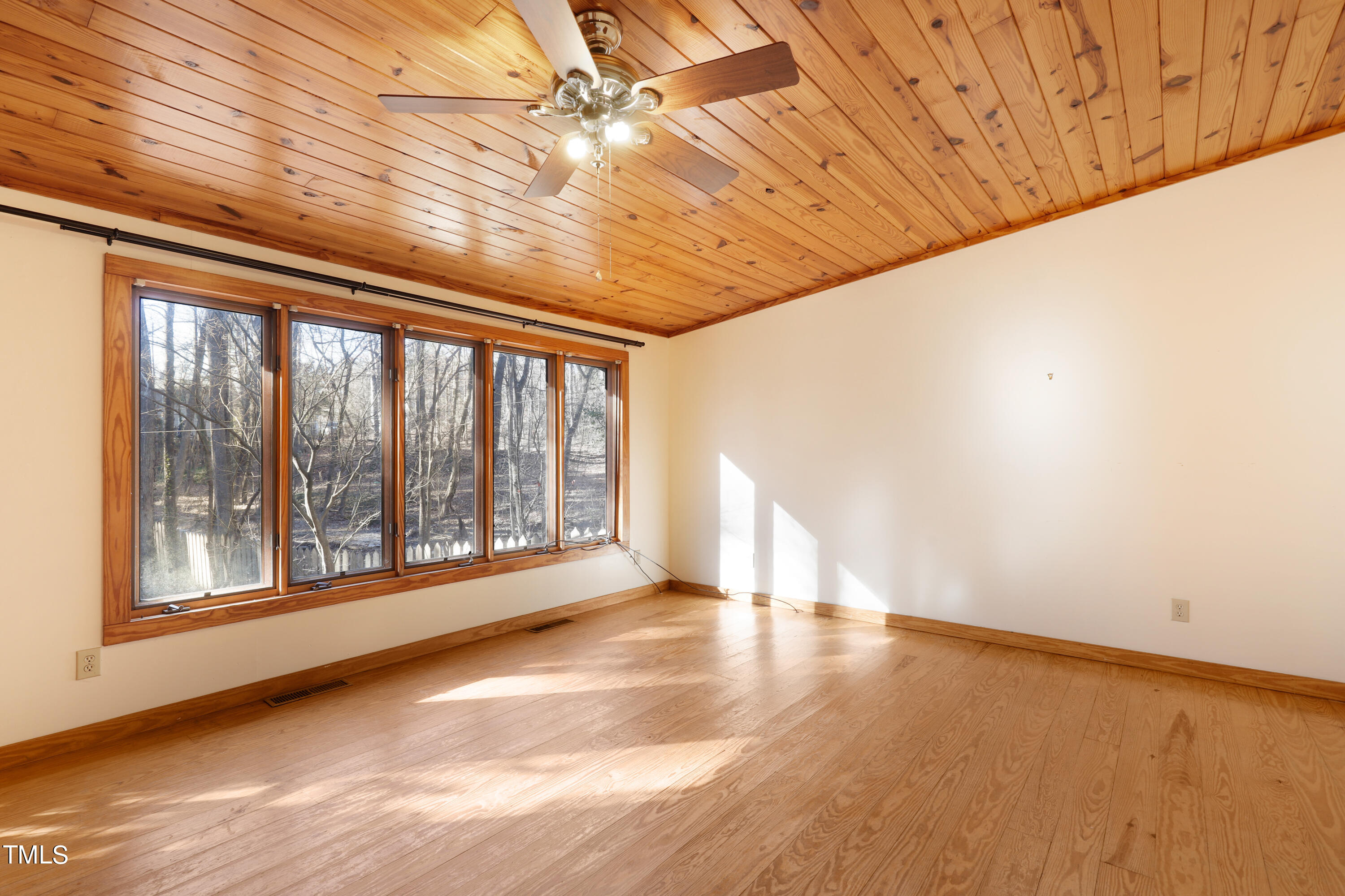 316 Clark Lake Road Durham, NC 27707 - Photo 32 of 65 a view of an empty room with a window