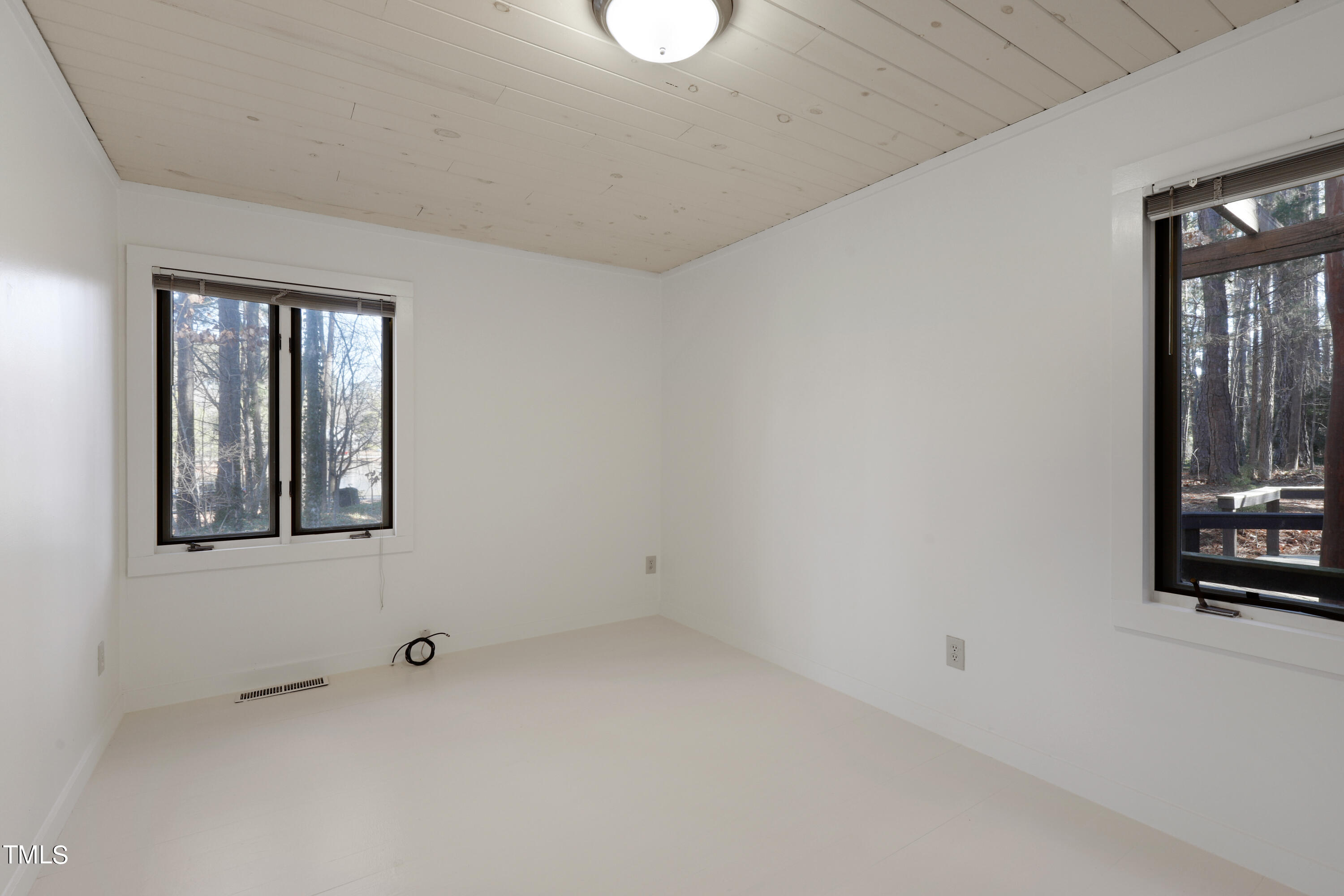 316 Clark Lake Road Durham, NC 27707 - Photo 34 of 65 an empty room with windows