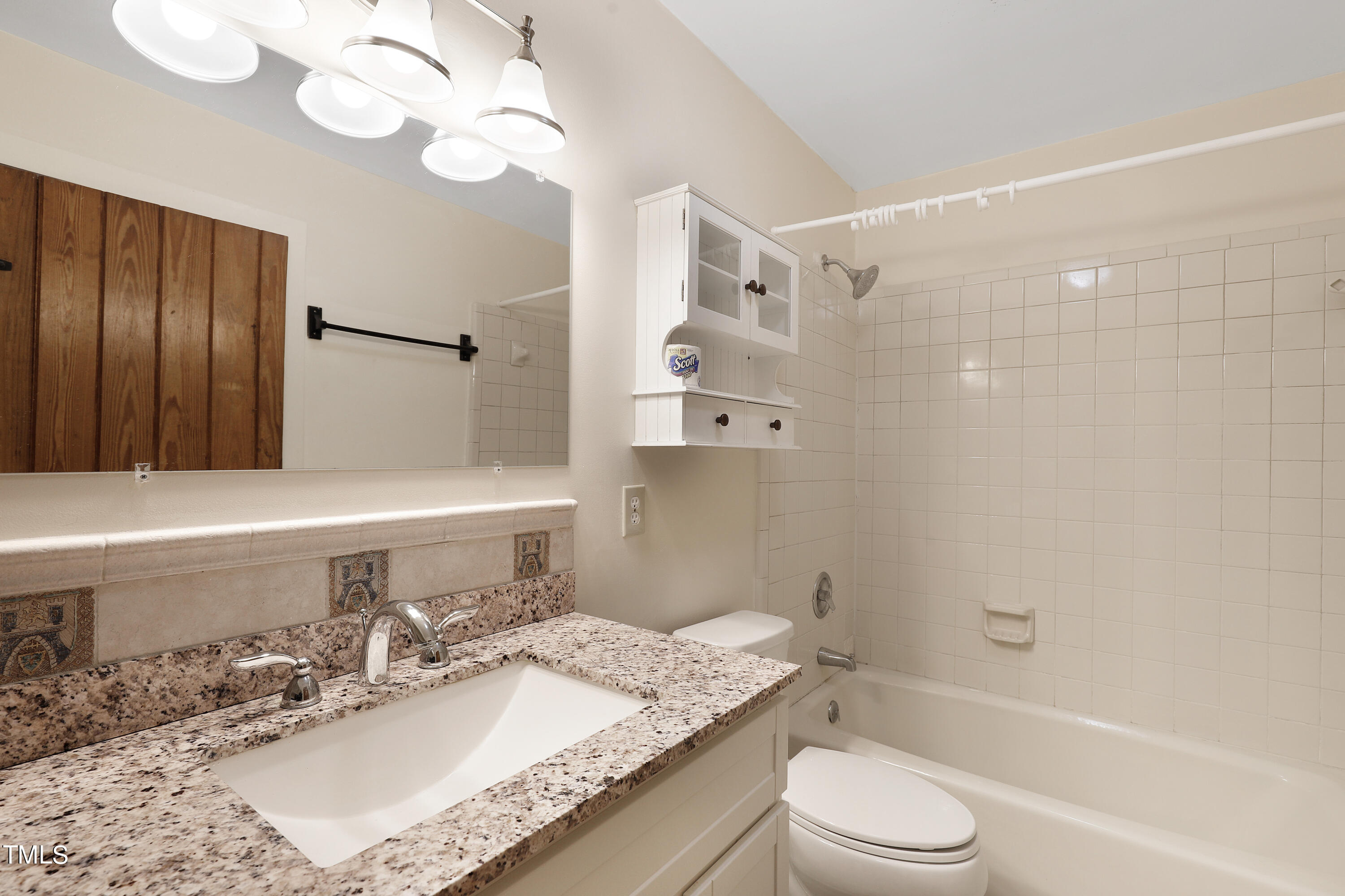 316 Clark Lake Road Durham, NC 27707 - Photo 40 of 65 a bathroom with a granite countertop sink a toilet and shower