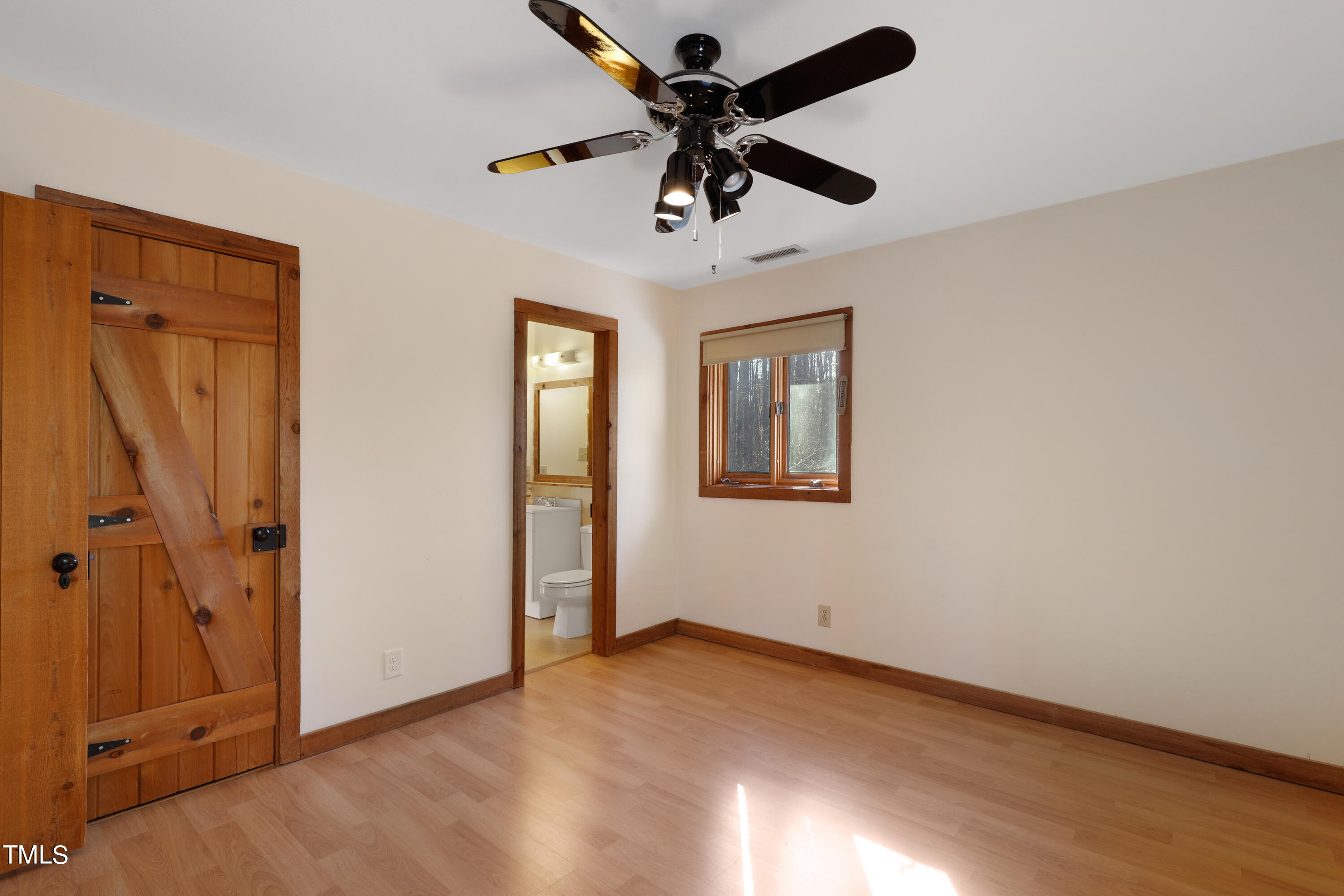 316 Clark Lake Road Durham, NC 27707 - Photo 44 of 65 wooden floor and window in an empty room