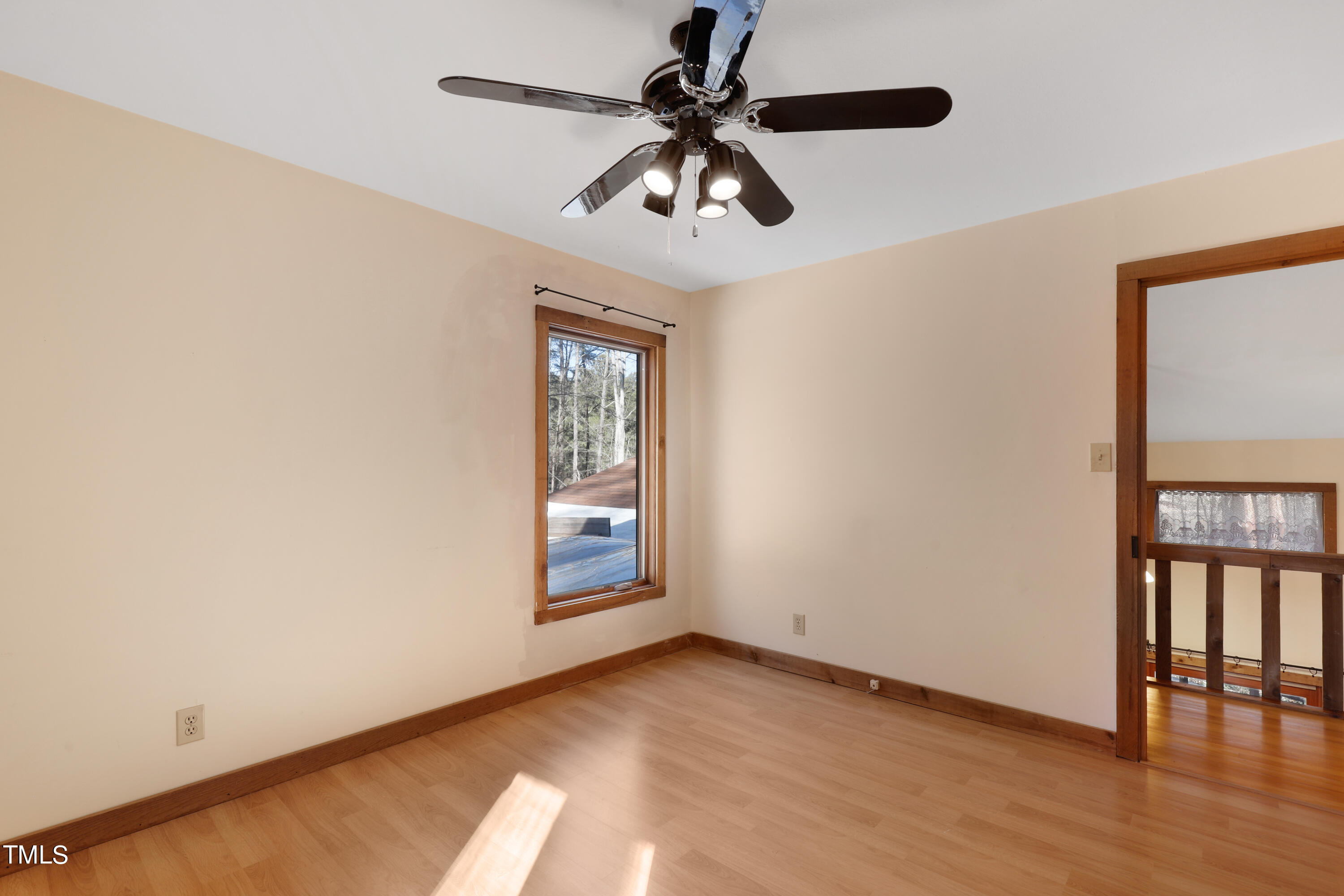 316 Clark Lake Road Durham, NC 27707 - Photo 46 of 65 an empty room with windows and fan