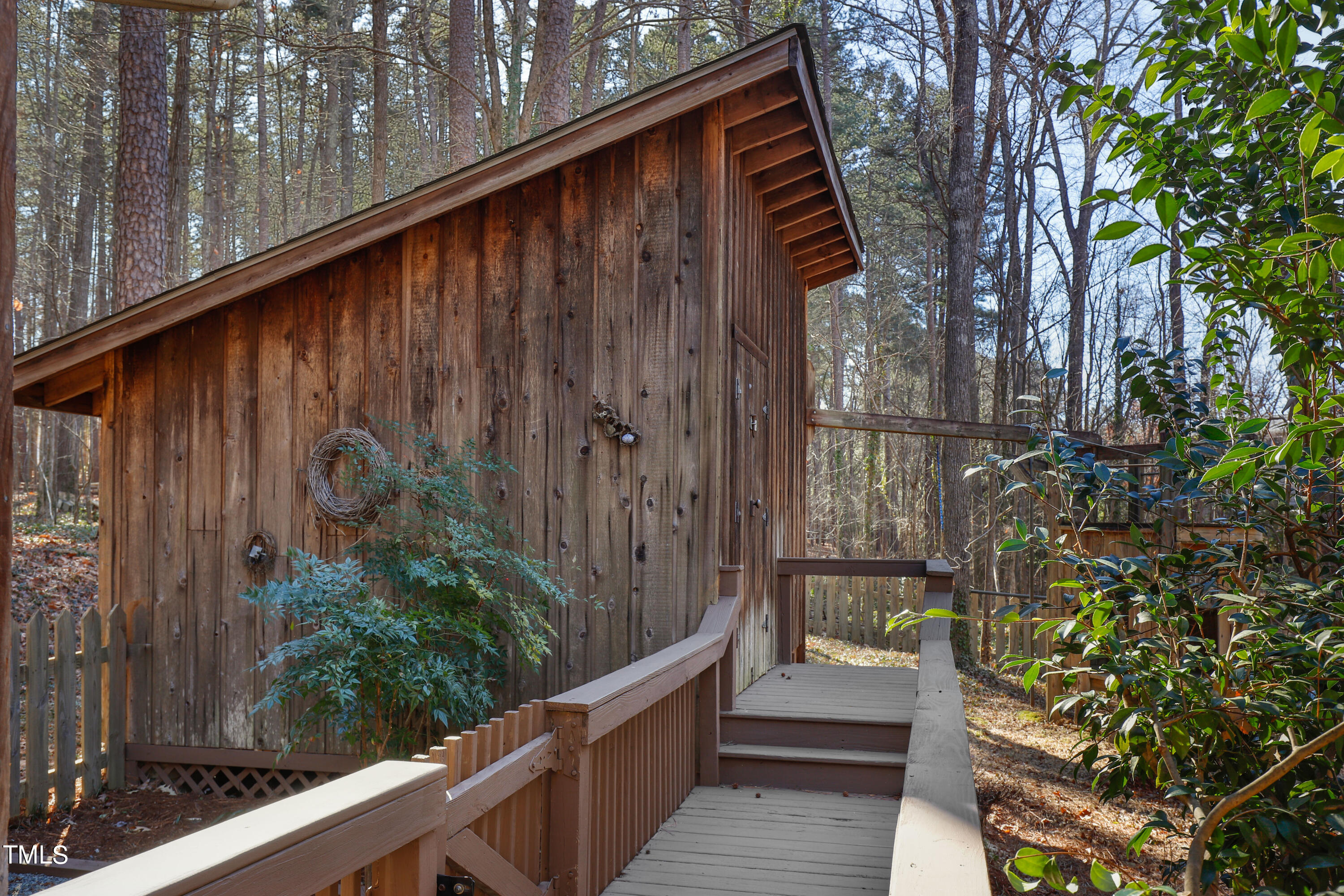 316 Clark Lake Road Durham, NC 27707 - Photo 65 of 65 a view of a balcony with stairs