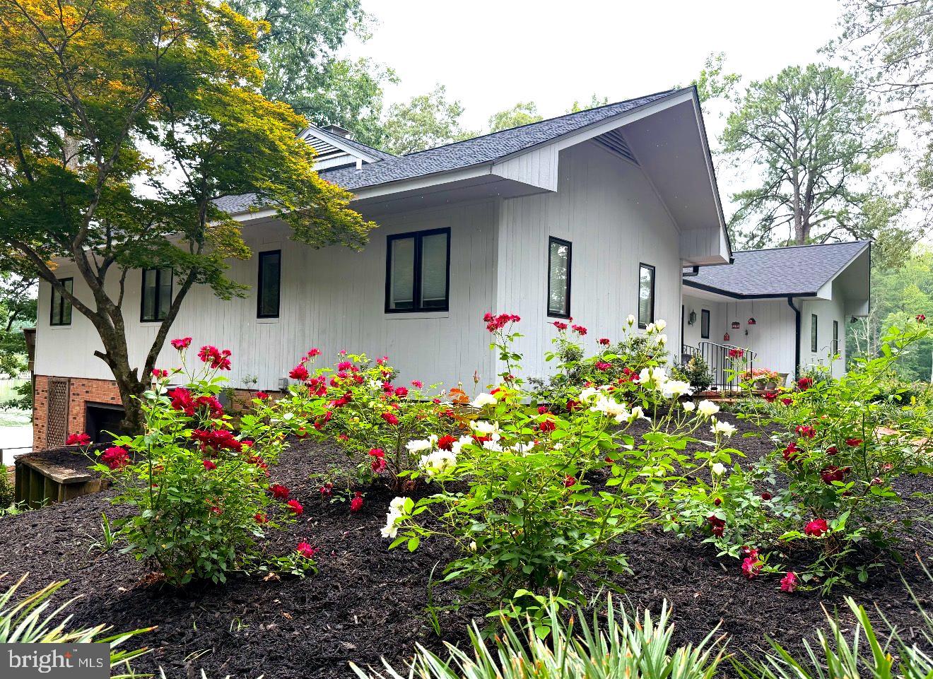 750 Levelgreen Road Lancaster, VA 22503 - Photo 2 of 7 Beautiful grounds established by a master gardener