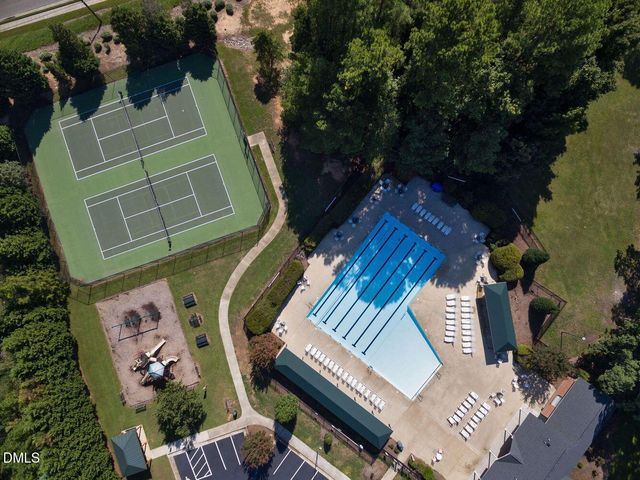 a view of balcony with wooden floor