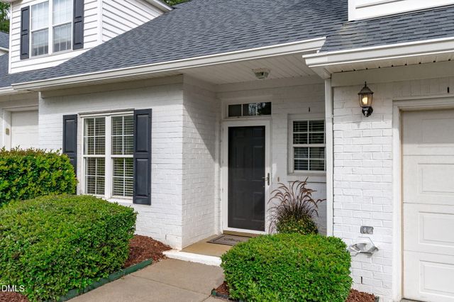 a front view of a house with a garage