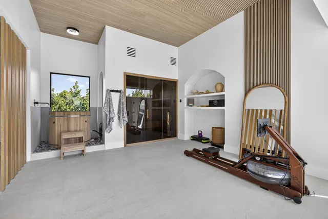 a kitchen with a sink and a refrigerator