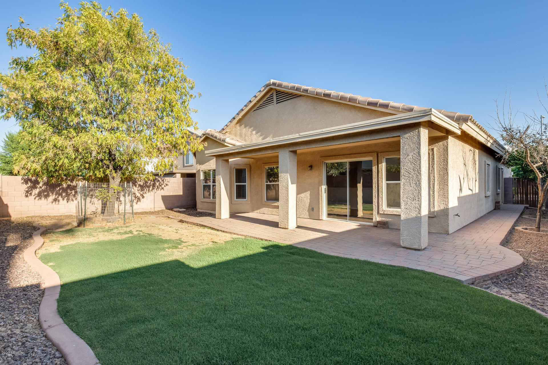 15644 West Calavar Road Surprise, AZ 85379 - Photo 5 of 34 front view of a house with a yard