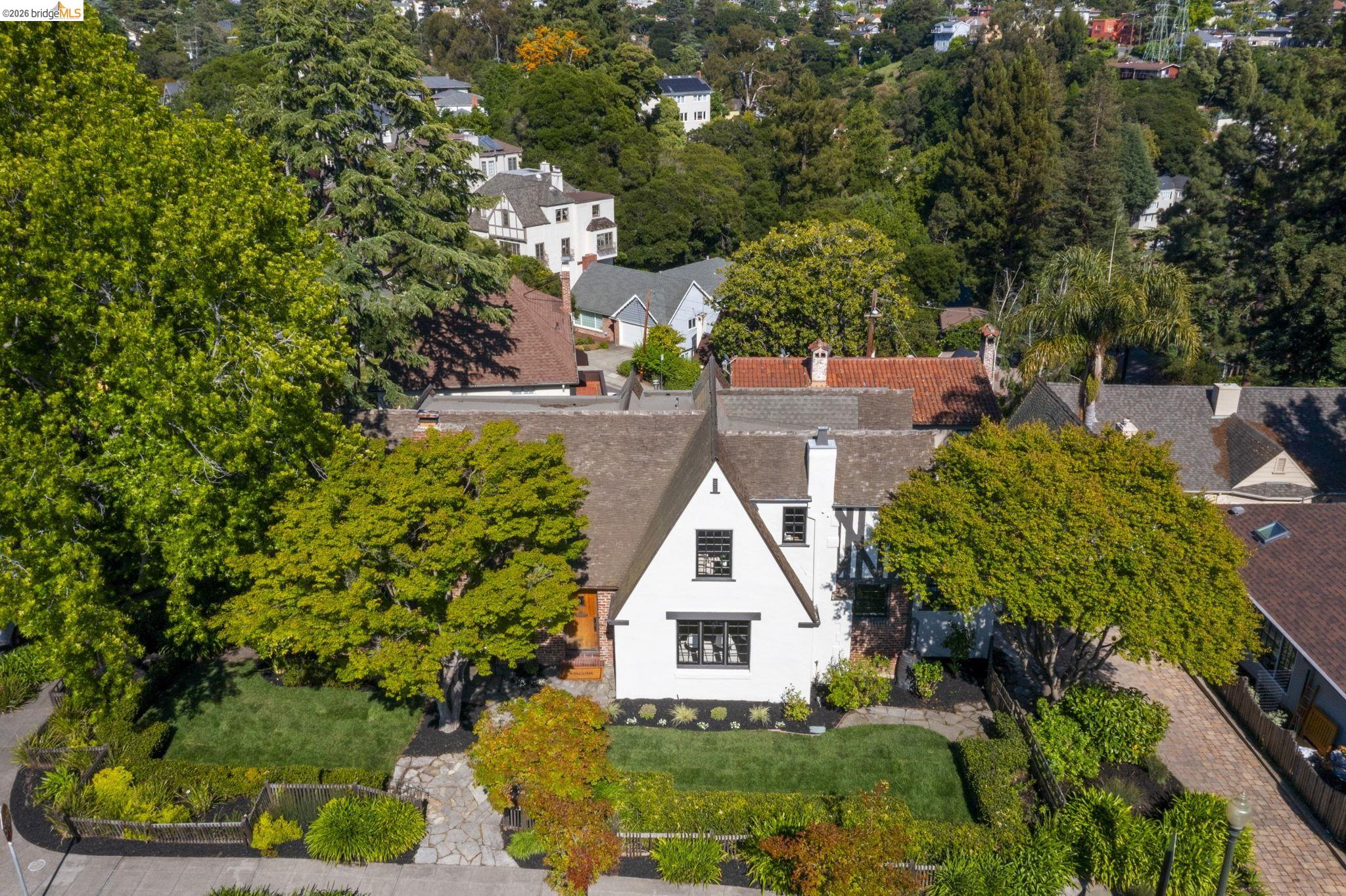 1087 Hubert Road Oakland, CA 94610 - Photo 64 of 67 Gabled roofline residence featuring white siding and dark trim