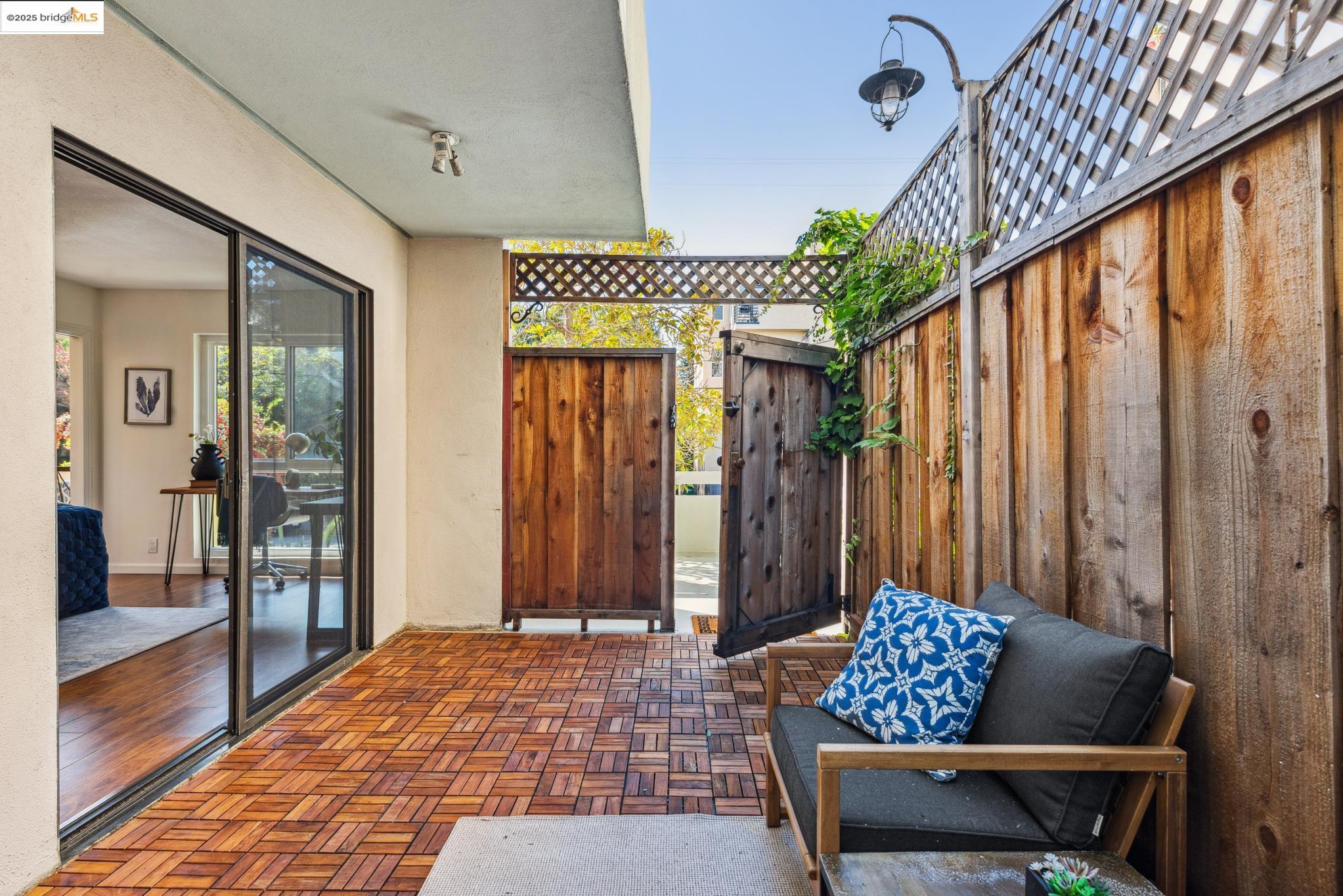 651 Oakland Avenue, Unit 1E Oakland, CA 94611 - Photo 23 of 28 a bedroom with furniture and a window