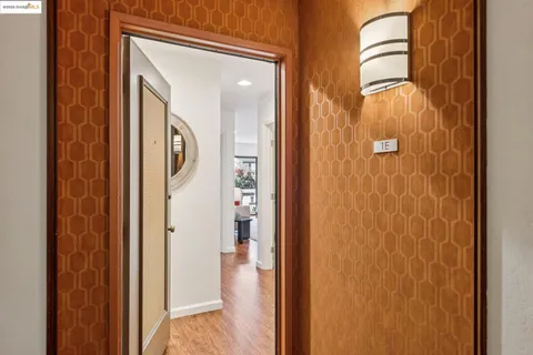 a view of a bathroom from a hallway