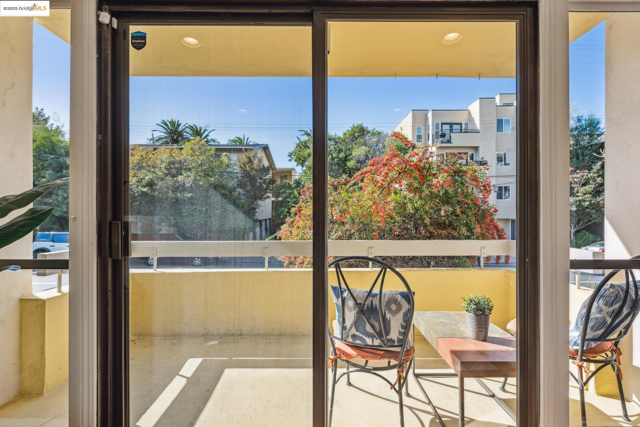 651 Oakland Avenue, Unit 1E Oakland, CA 94611 - Photo 4 of 28 a view of a room with a large window and front table