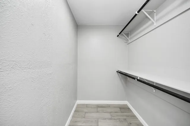 a view of a room with racks on the wall