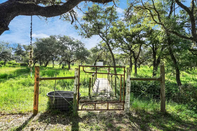 a view of a lake from a balcony with outdoor space