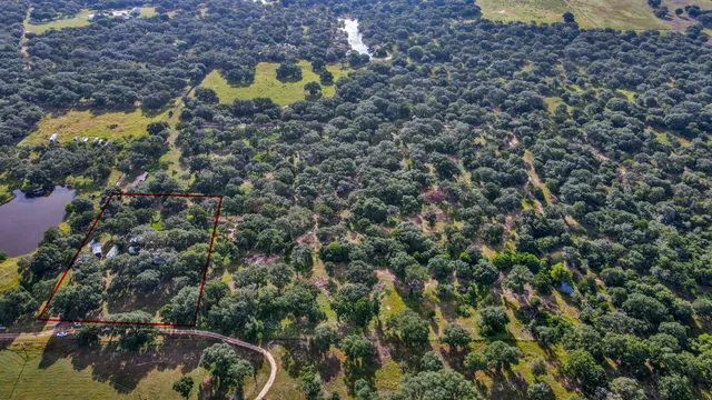 a view of a back yard of the house and front of a house
