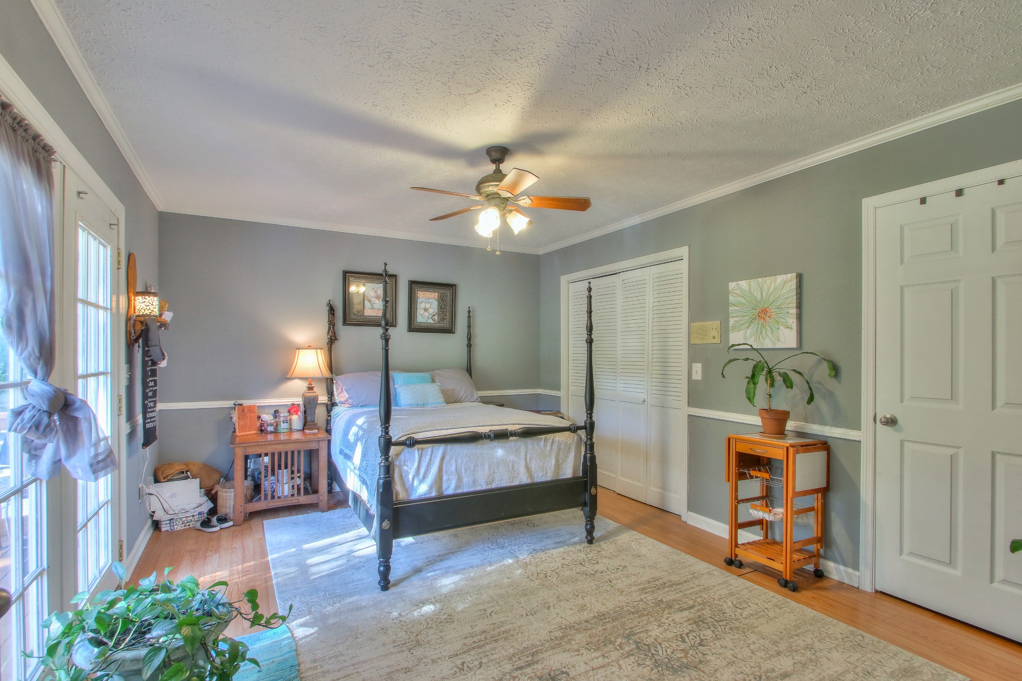 416 Harsh Lane Castalian Springs, TN 37031 - Photo 12 of 31 a bedroom with bed and window