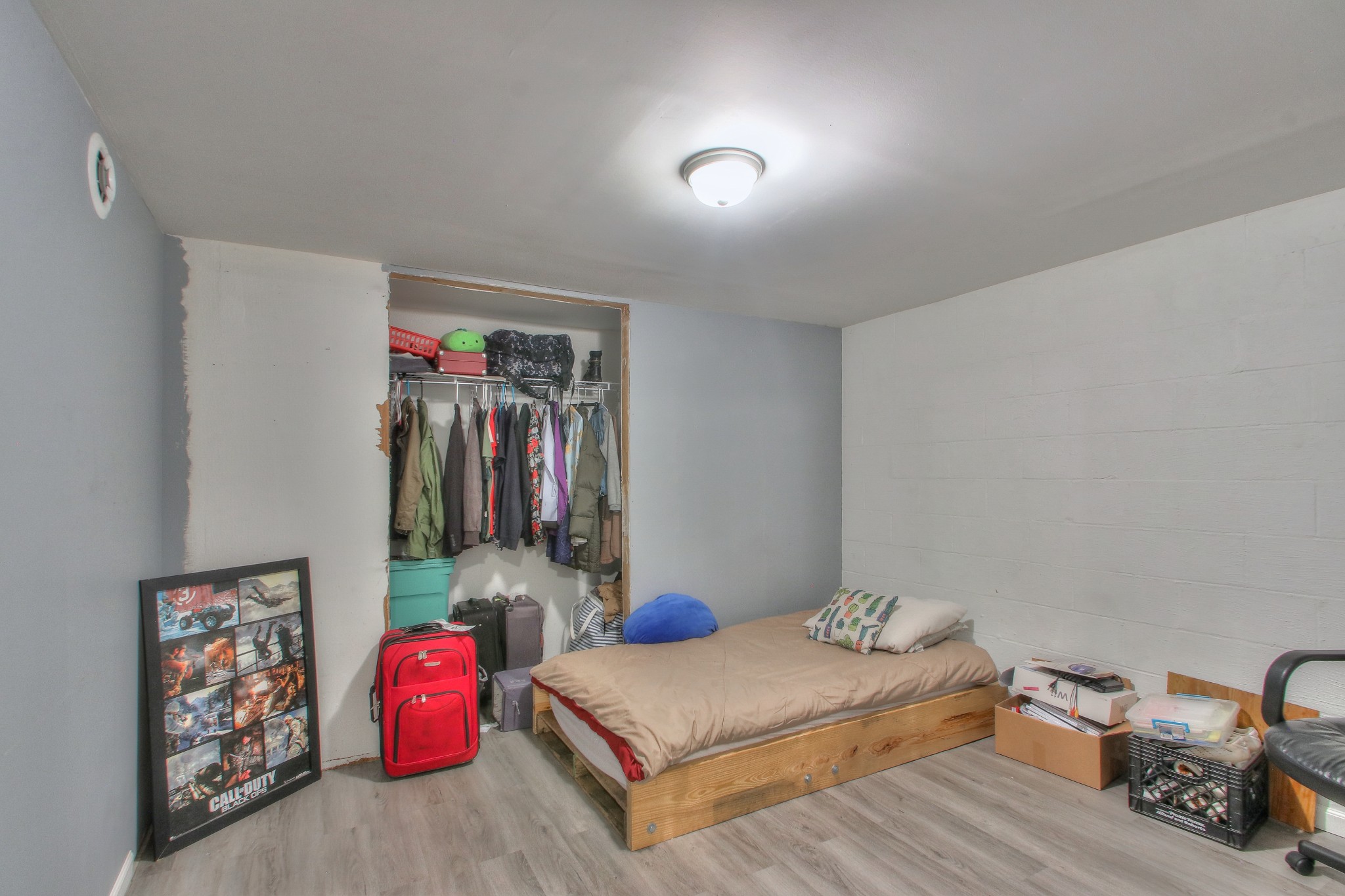 416 Harsh Lane Castalian Springs, TN 37031 - Photo 22 of 31 a bedroom with furniture and a wooden floor