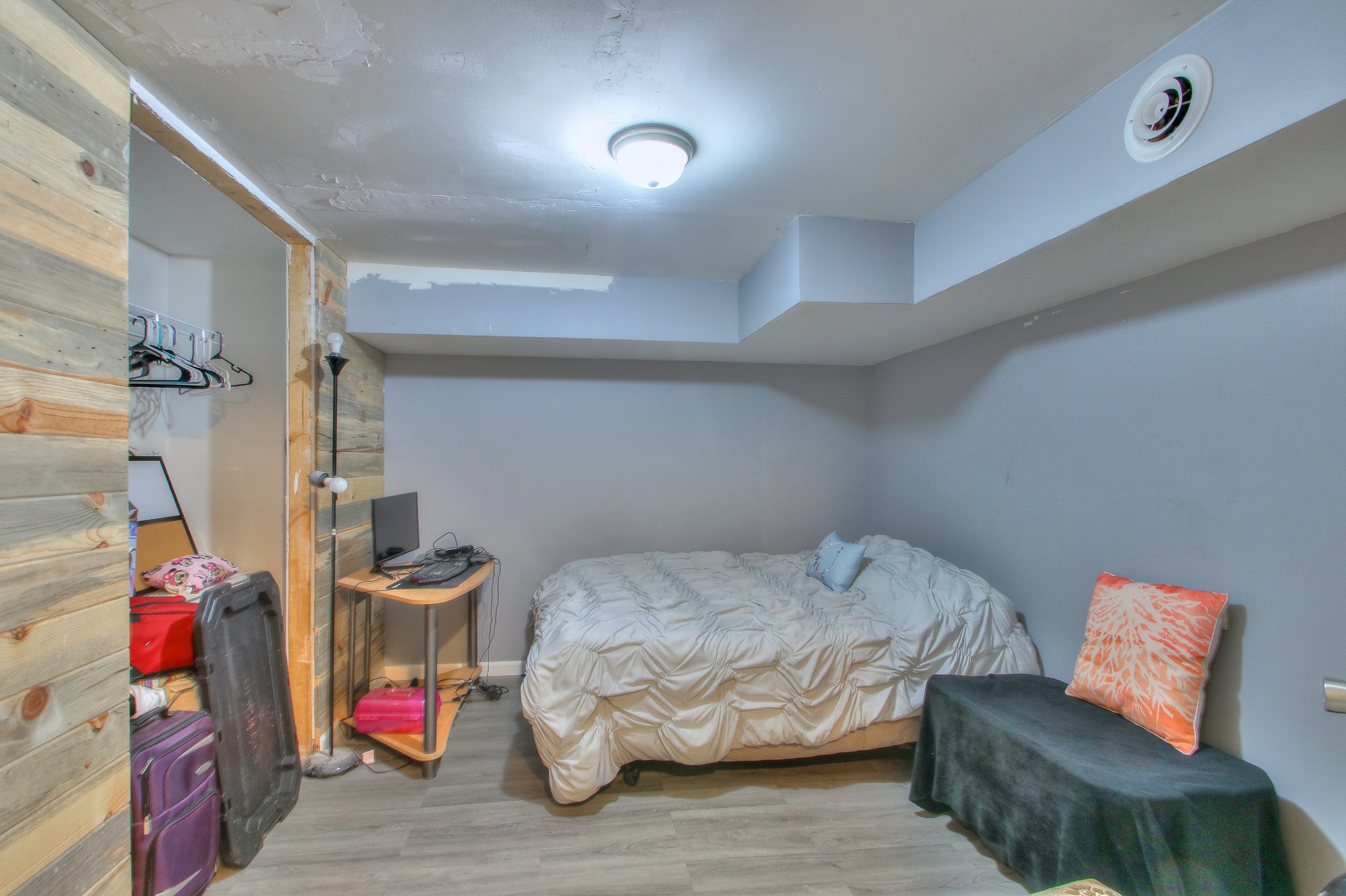 416 Harsh Lane Castalian Springs, TN 37031 - Photo 23 of 31 a bedroom with a bed and a couch