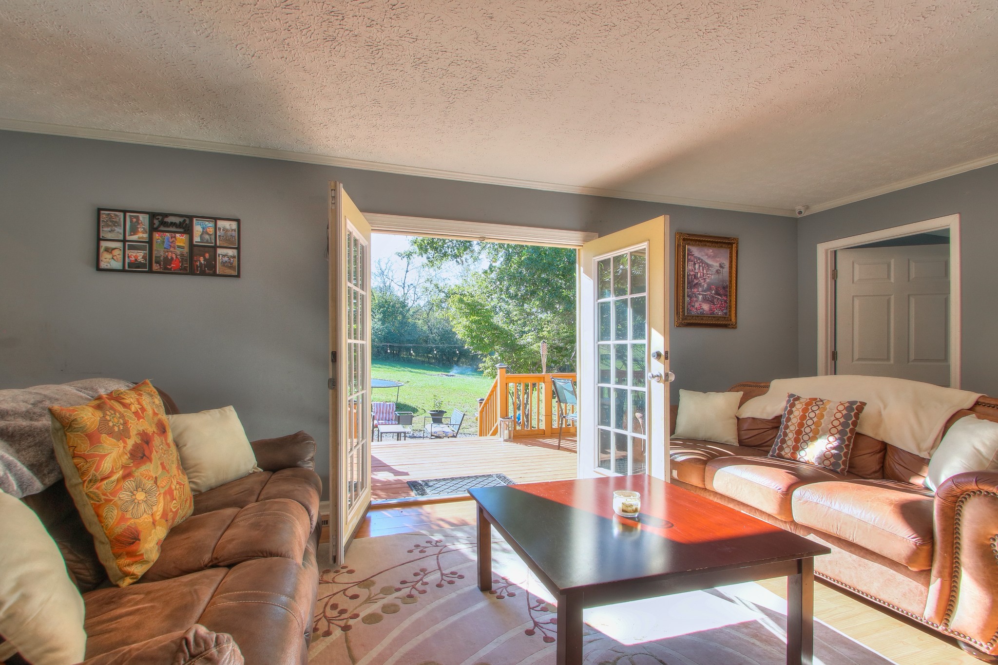 416 Harsh Lane Castalian Springs, TN 37031 - Photo 25 of 31 a living room with furniture and a large window