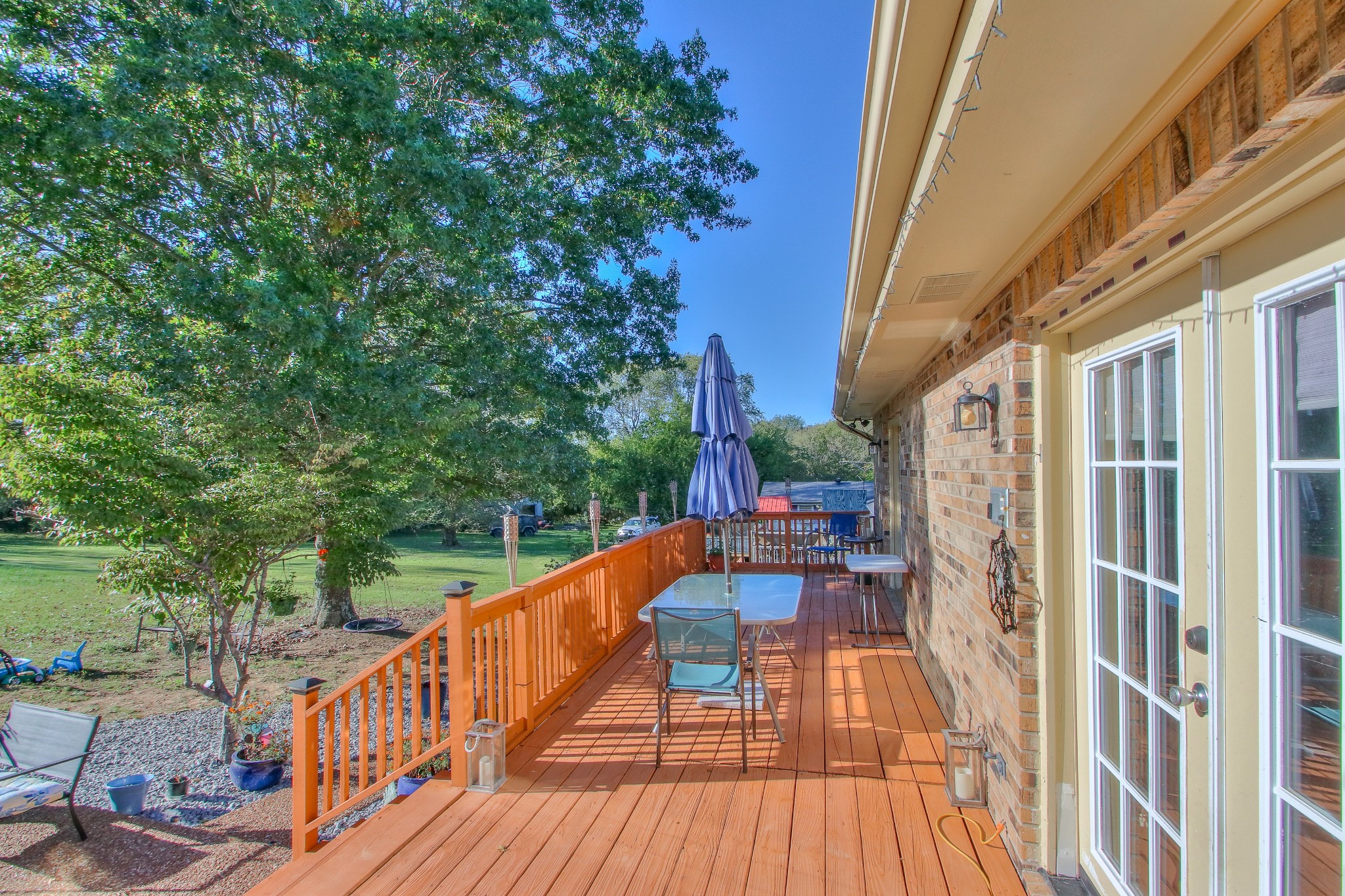 416 Harsh Lane Castalian Springs, TN 37031 - Photo 26 of 31 a view of balcony with chairs and wooden fence