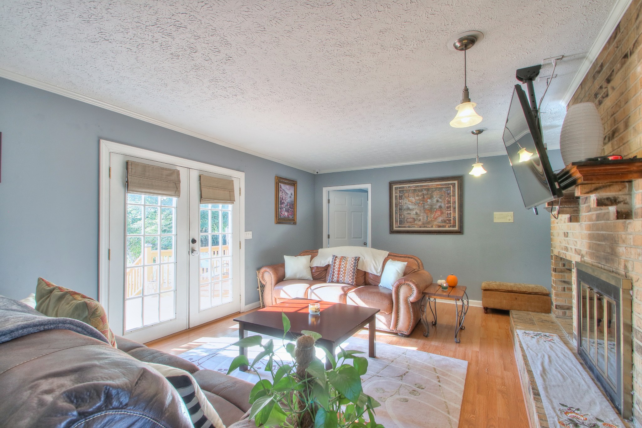 416 Harsh Lane Castalian Springs, TN 37031 - Photo 8 of 31 a bedroom with furniture and a wooden floor