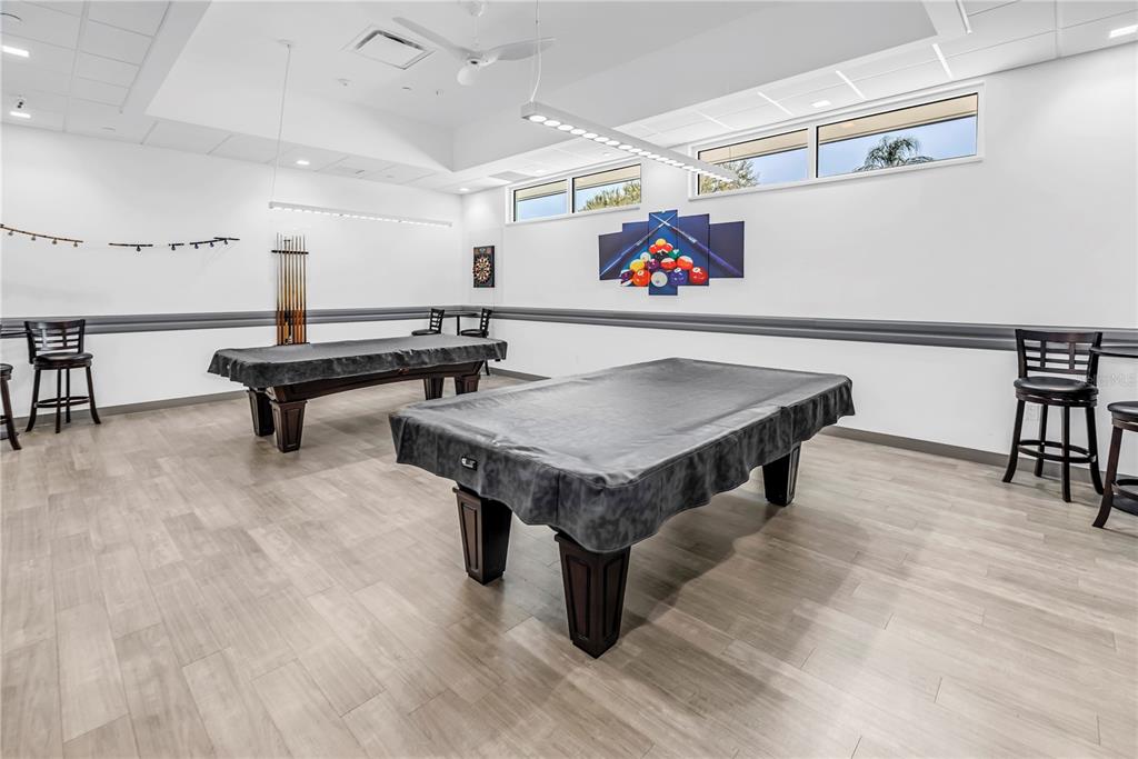 1100 South Belcher Road, Unit 502 Largo, FL 33771 - Photo 42 of 51 a room with furniture and air hockey table