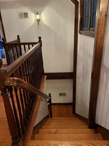 16 A Stowe Road, Unit A Southborough, MA 01772 - Photo 7 of 10 a view of a balcony with wooden floor