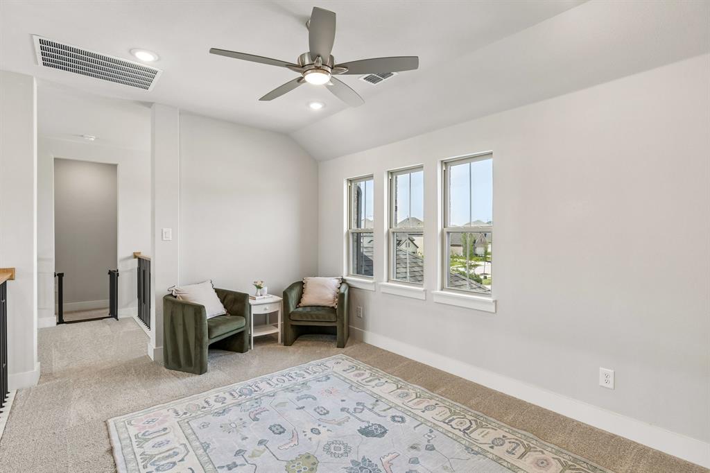 3004 Windy Rdg Road McKinney, TX 75071 - Photo 22 of 40 a living room with furniture and a window