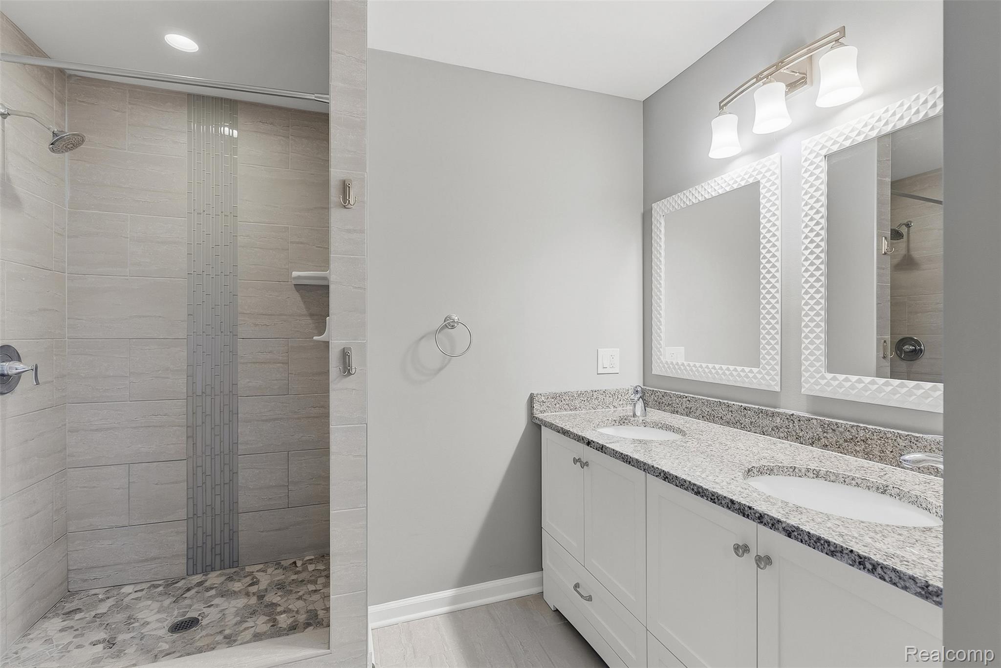 1750 Henbert Road West Bloomfield, MI 48324 - Photo 19 of 32 Dual vanity with stone countertop and undermount sinks