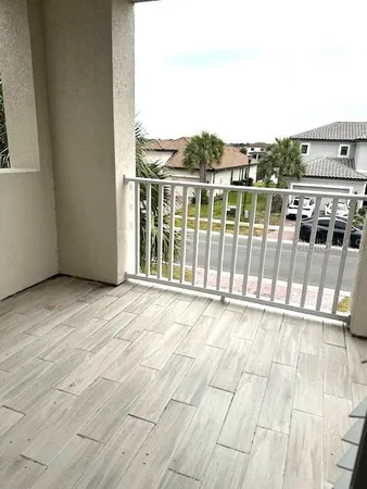 a view of a balcony with an outdoor space